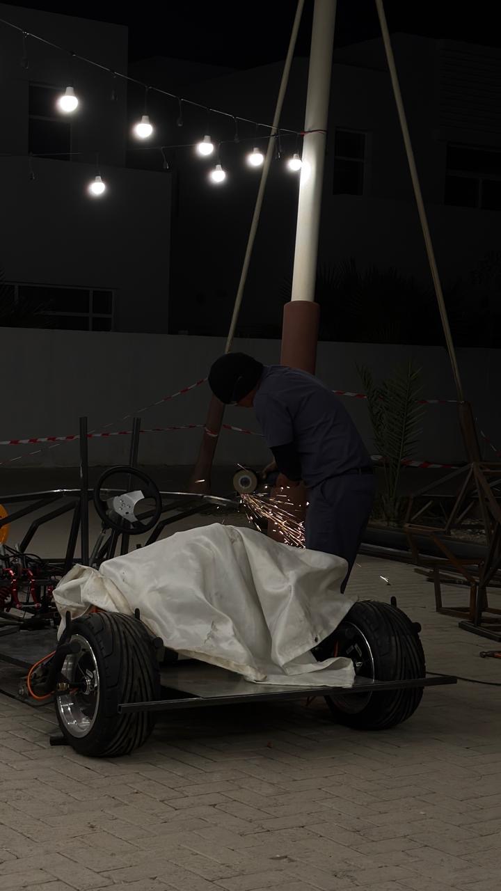 Grinding under the string lights, steering wheel already fitted